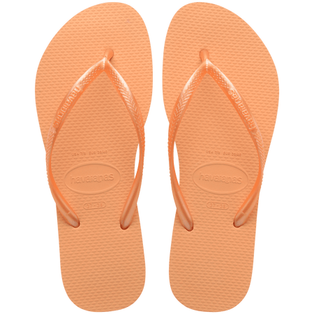 Women's orange flip flops with orange metallic straps, top view