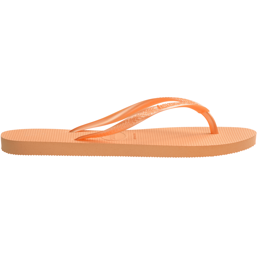 Women's orange flip flops with orange metallic straps, side view