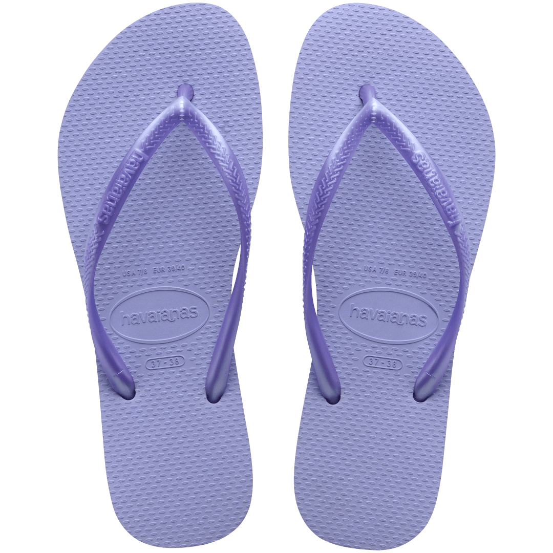 Kids' light purple flip flops with metallic purple straps, top view