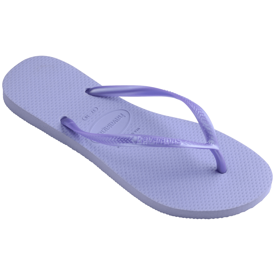 Kids' light purple flip flops with metallic purple straps, 3/4 side view