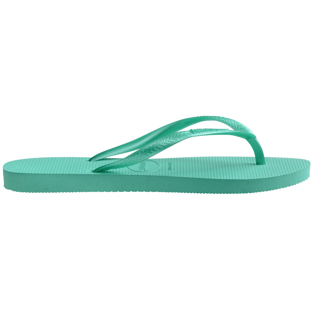 Kids' foam green flip flop with metallic green straps side view