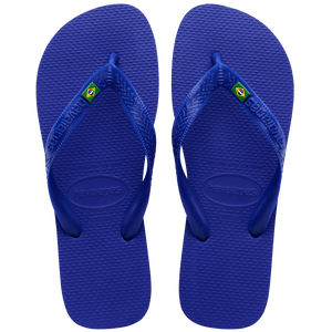 Women's cobalt blue flip flop with Brazil flag detail on the straps, top view