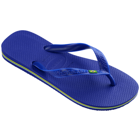 Women's cobalt blue flip flop with Brazil flag detail on the straps, right 3/4 view