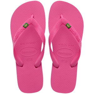 Women's bright pink flip flop with Brazil flag on the straps, top view