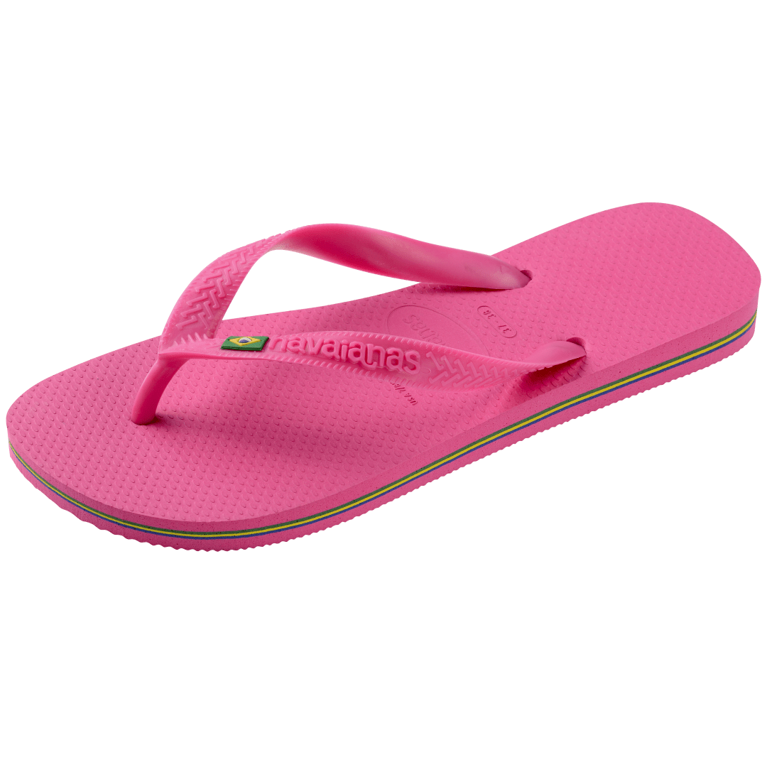 Women's bright pink flip flop with Brazil flag on the straps and contrast stripes in sole, left 3/4 view