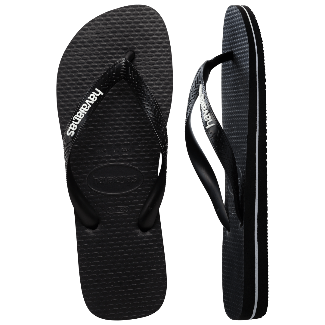 Kids' black flip flops with white stripe contrast sole top and side view