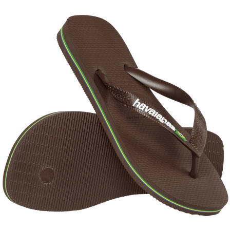 brown flip flops with havaianas written in white on the straps and a Brazil flag, one shoe leaning on the other shoe toe side down