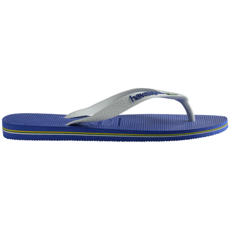 Kids' cobalt blue flip flop with white straps and Brazil flag detail, side view