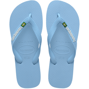 light blue flip flops with a brazil flag on the strap and havaianas written in white, top view