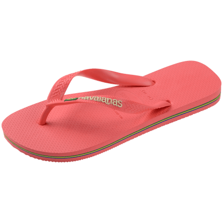 coral pink flip flops with pink straps that feature a small brazil flag, front left view