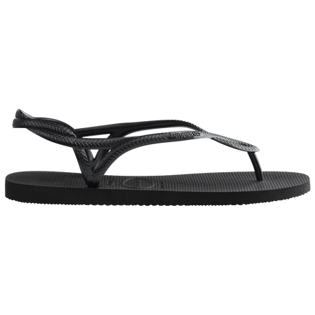 Women's black sandal with figure 8 strap detail, side view