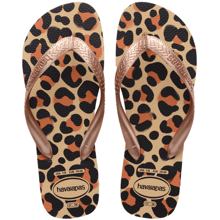 flip flops with black, brown, and beige leopard print and beige metallic straps, top view