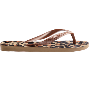 flip flops with black, brown, and beige leopard print and beige metallic straps, side view
