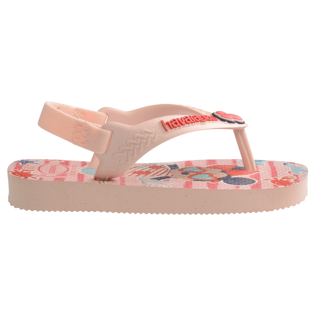 baby sandal with mickey and minnie mouse on pink background with sea creatures and a mickey mouse charm on the pink strap, side view