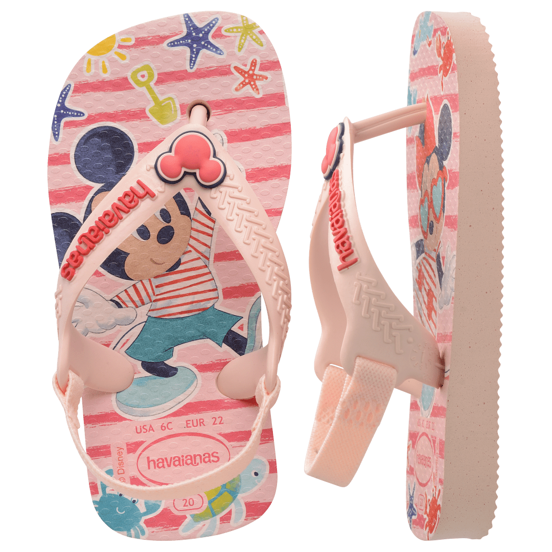 baby sandal with mickey and minnie mouse on pink background with sea creatures and a mickey mouse charm on the pink strap, left sandal top view, right sandal side view