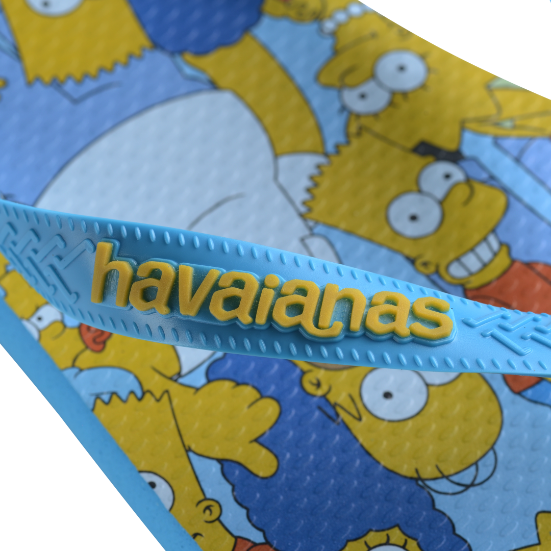 Men's multicolor The Simpsons flip flops with light blue strap and sole logo detail view