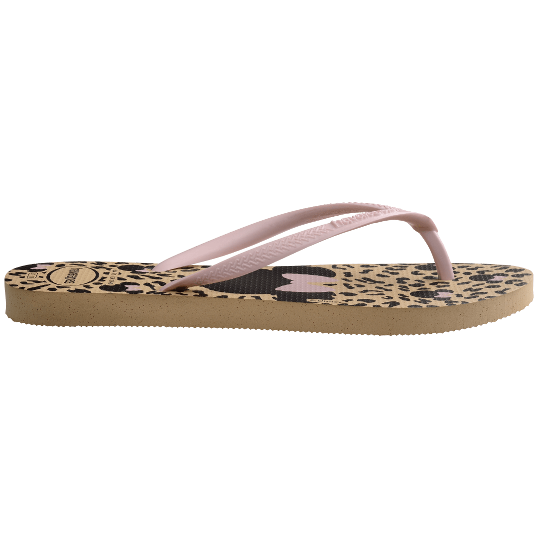 Women's tan and black animal print Disney's Minnie Mouse x Havaianas flip flops with light pink straps side view