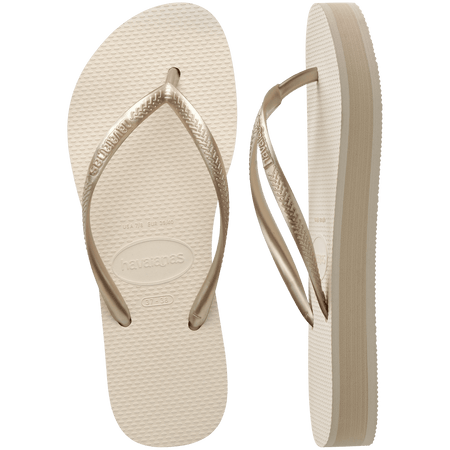 beige platform flip flop, with a darker beige colored midlayer between the sole and bottom of the flip flop, beige metallic straps, one flip flop top view, one side view