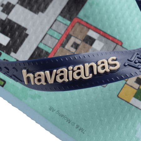 Kids' multicolor Minecraft flip flop with navy strap detail logo view