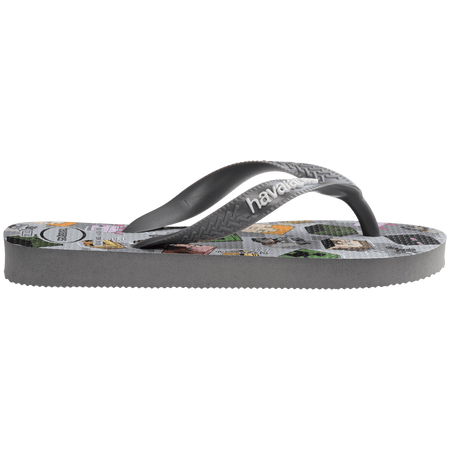 Flip flops with Minecraft blocks on a grey background, mix of green, yellow, pink, blocks and grey straps, side view