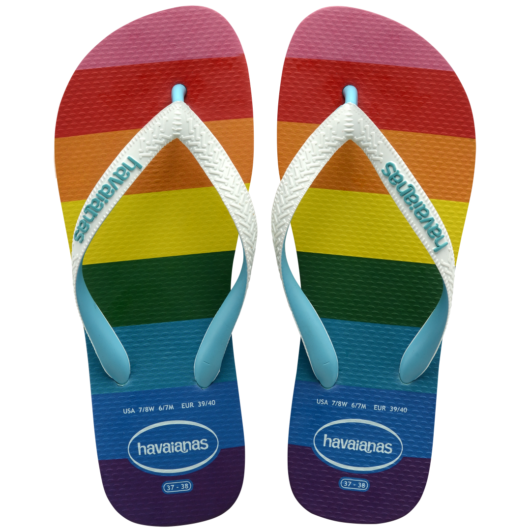 Rainbow stripe flip flops with white straps top view