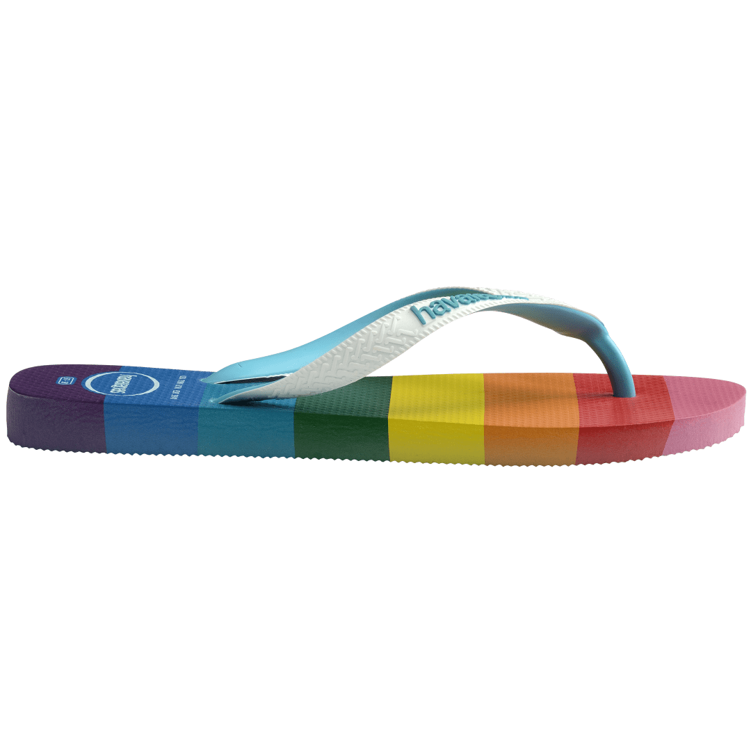 Rainbow stripe flip flops with white straps side view