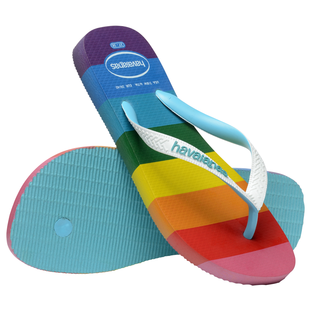 Rainbow stripe flip flops with white straps top view and blue sole view