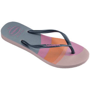 Kid's multicolor abstract print of sunset over the horizon of waves flip flops with navy glitter straps and pink logo 3/4 side view