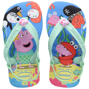 peppa pig and friends on blue background with sea creatures, peppa pig charm on seafoam green straps, top view