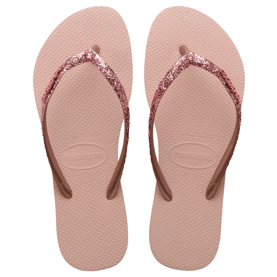 Women's light pink flip flop with pink glitter straps, top view