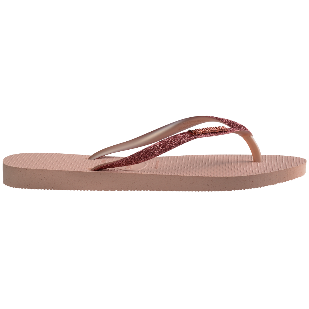 Kids' light pink flip flop with pink glitter straps side view