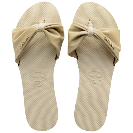 Women's cream sandal with bow detail, top view