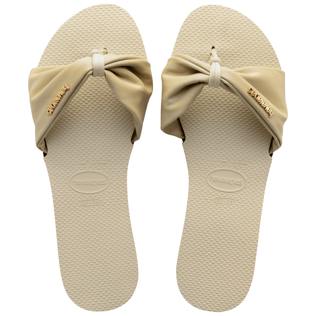 Women's cream sandal with bow detail, top view