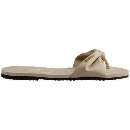 Women's cream sandal with bow detail, side view