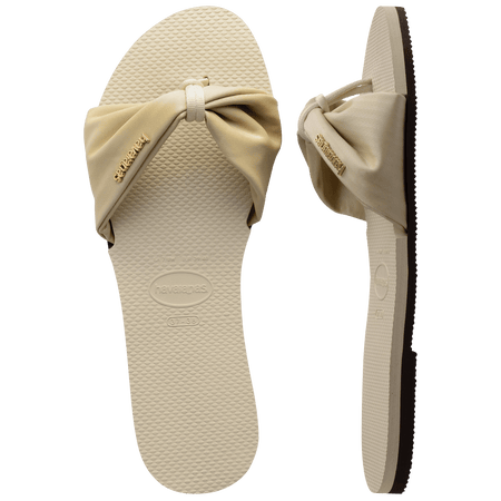 Women's cream sandal with bow detail, top and side view