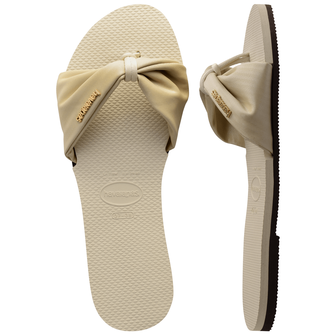 Women's cream sandal with bow detail, top and side view