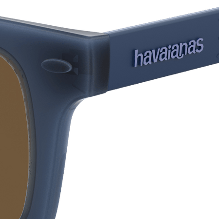 Men's navy and beige sunglasses, zoomed in view on havaianas logo on end-piece