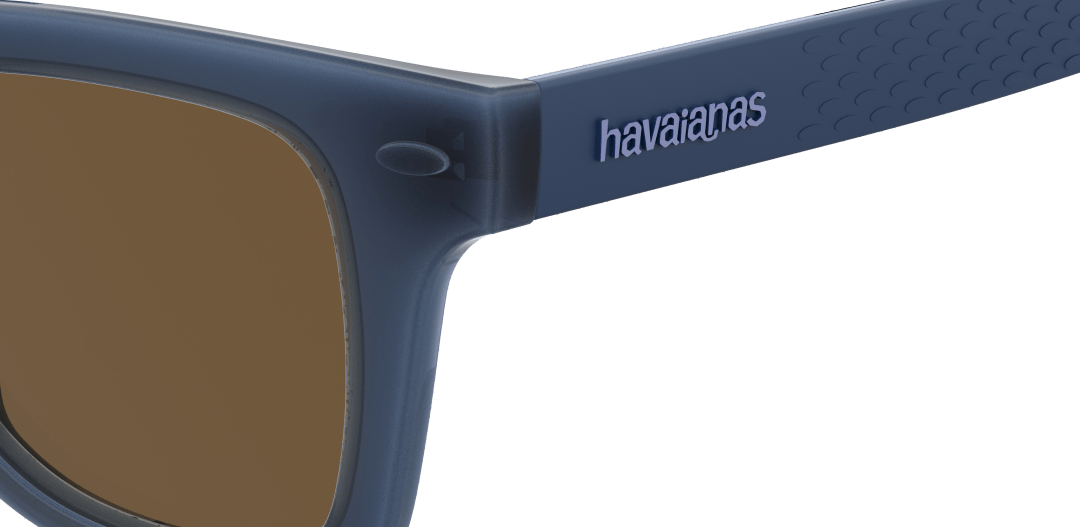 Men's navy and beige sunglasses, zoomed in view on havaianas logo on end-piece