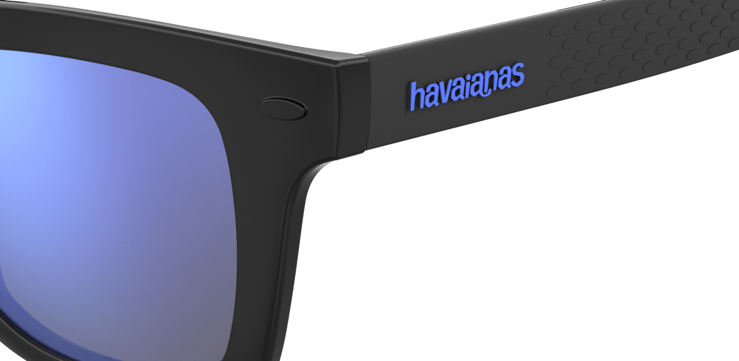 Men's black and blue sunglasses, zoomed in on end-piece on havaianas logo in blue