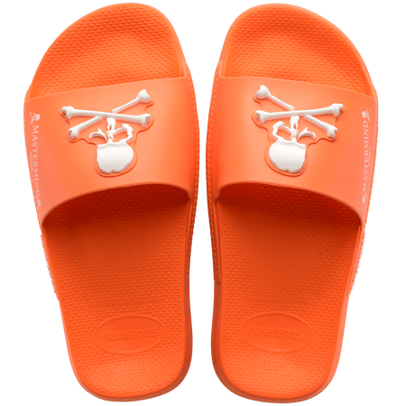 Men's Mastermind orange slides with white skull & cross-bones, top view