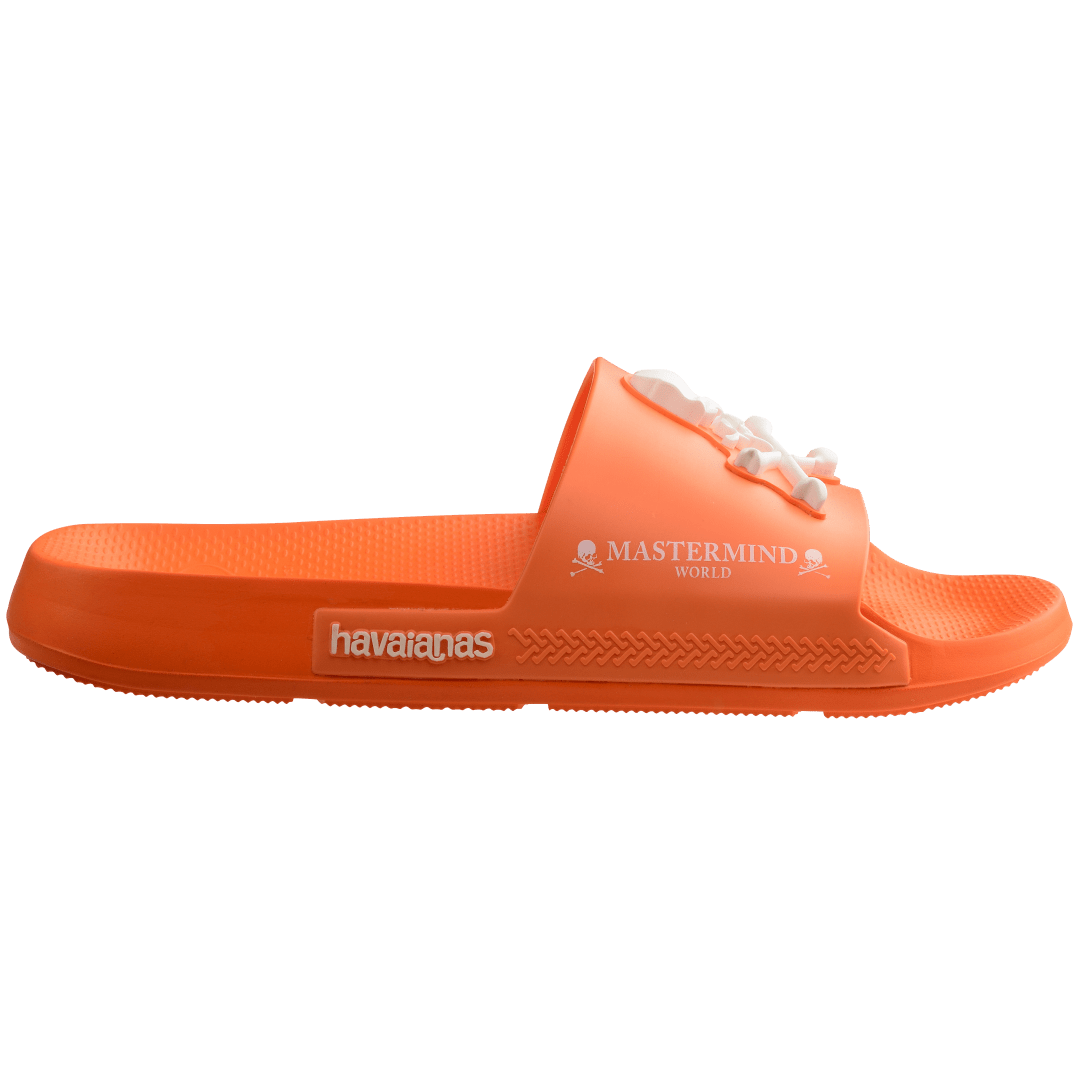 Men's Mastermind orange slides with white skull & cross-bones, side view