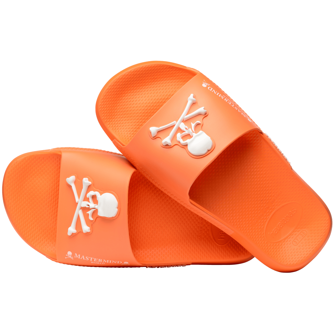 Men's Mastermind orange slides with white skull & cross-bones, alternate top view