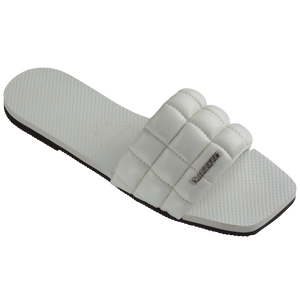 Women's white slide with puffy detail 3/4 side view