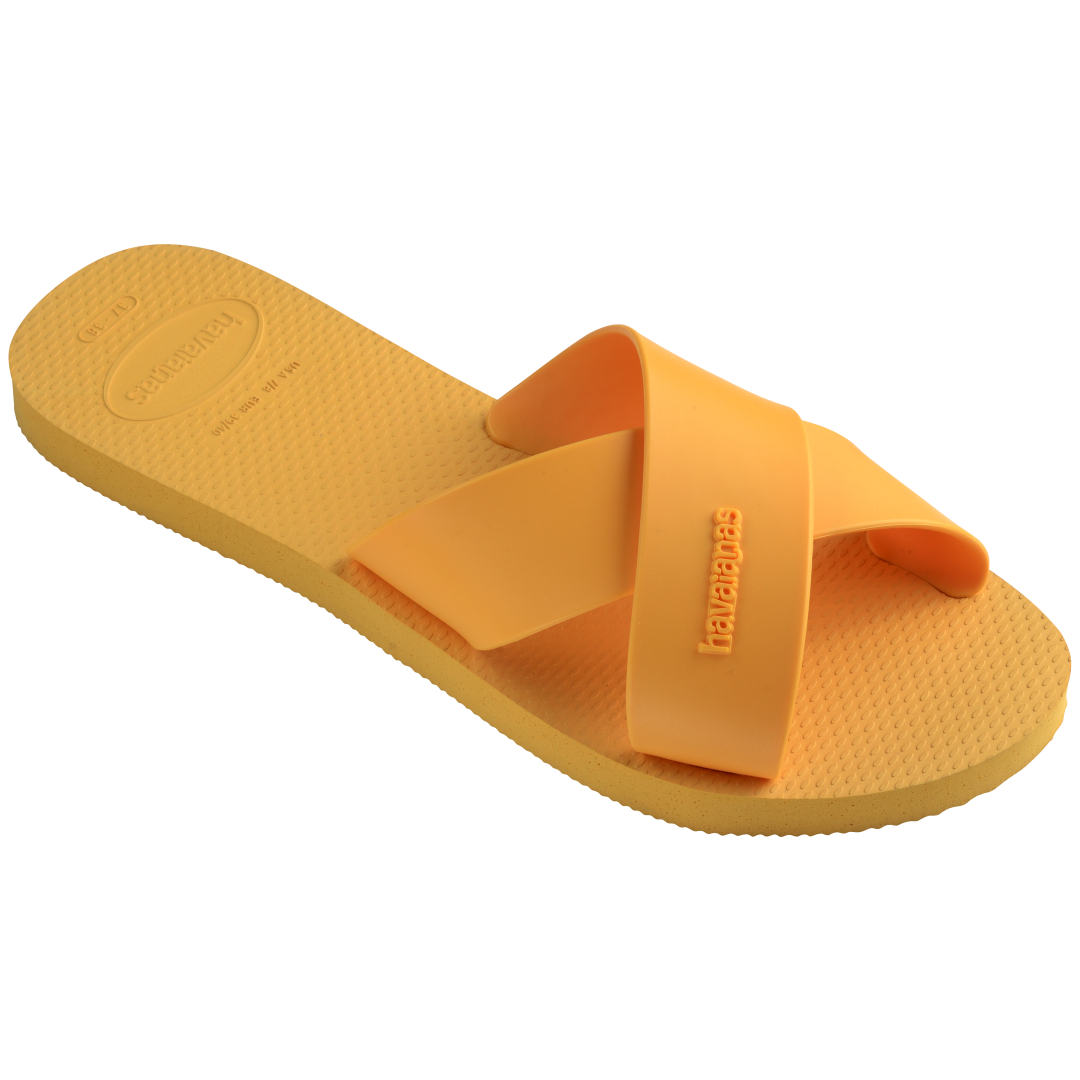 Women's solid orange yellow crisscross strap slide sandal 3/4 side view