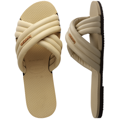 Cream criss-cross strap slide sandal top view and side view