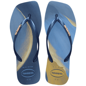 blue and yellow marbled flip flops with blue strap with gold metal havaianas logo, top view