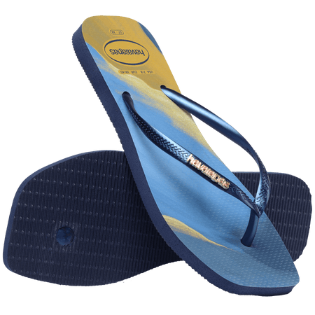 blue and yellow marbled flip flops with blue strap with gold metal havaianas logo, one shoe leaning on the other toe side down