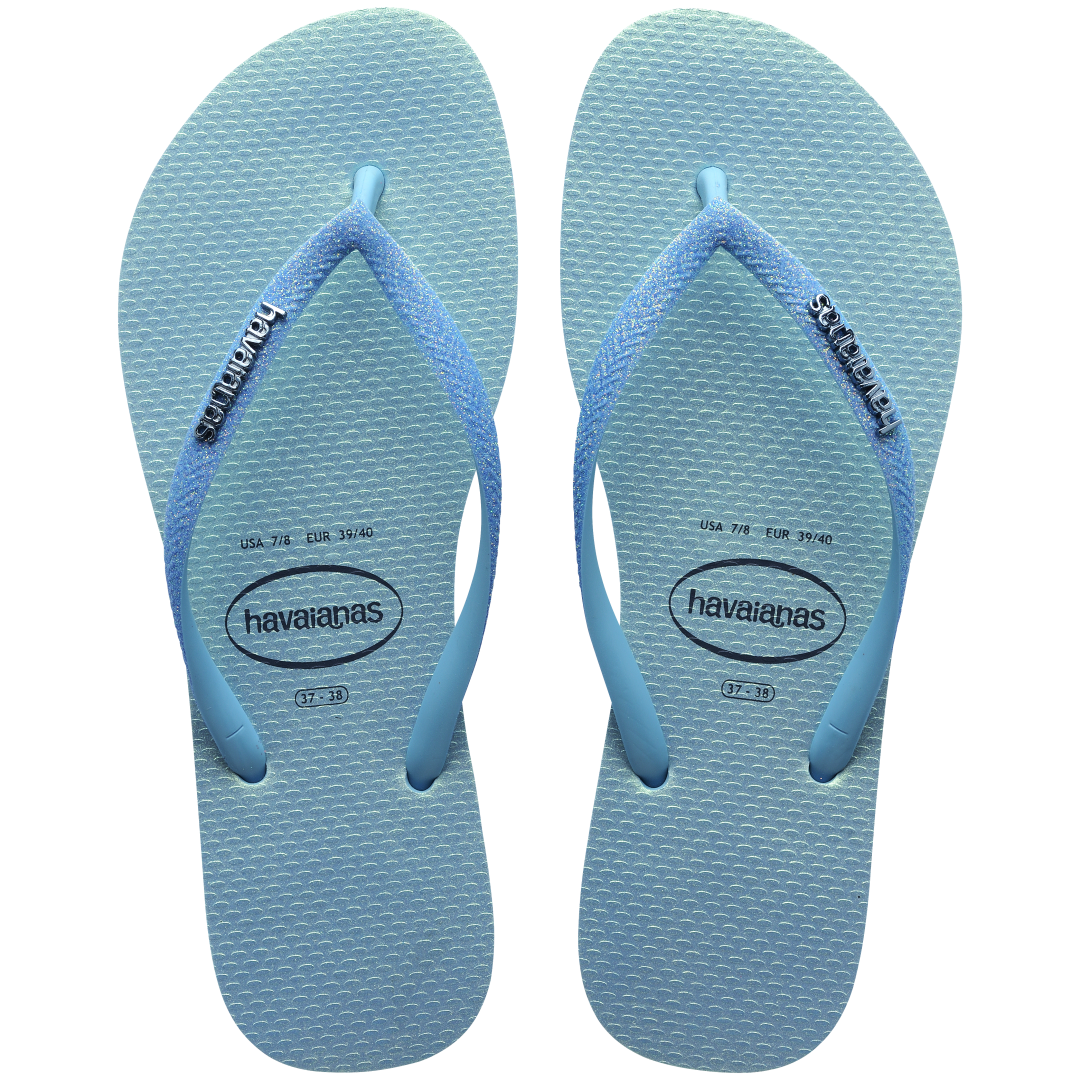 Kids' iridescent blue flip flops with glitter straps top view