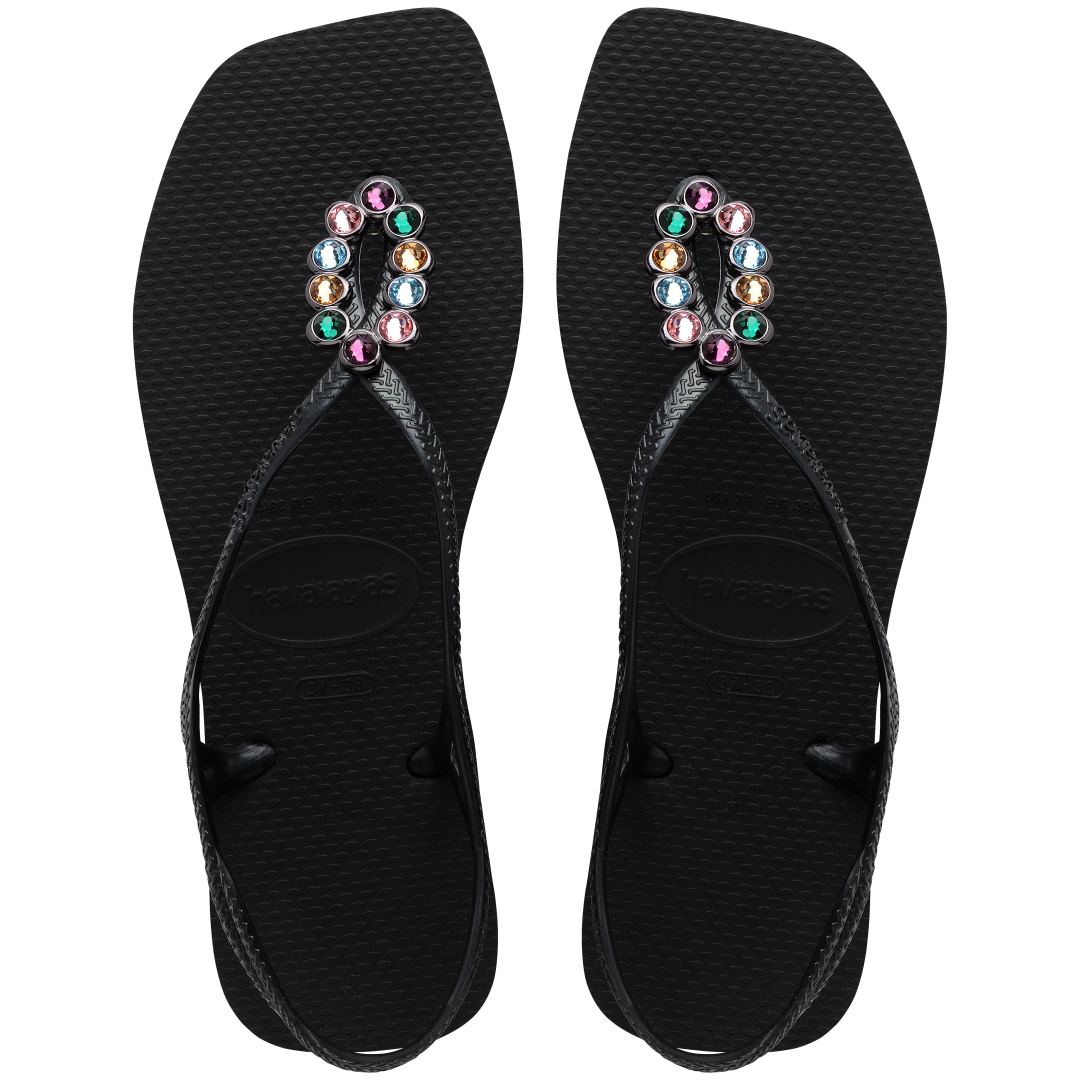 Women's black sandal featuring oval with multicolor crystal details top view