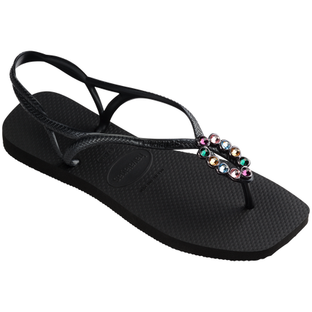 Women's black sandal featuring oval with multicolor crystal details  3/4 side view